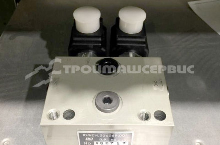 Блок клапанов дополнительного рабочего оборудования ЮФЕИ 306569.004 (004-10654)